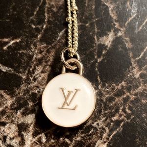 LV Charm Necklace. White and Gold charm. Excellent condition